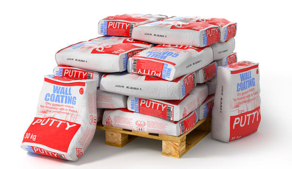 Putty bags stack on wooden pallet. Paper sacks isolated on white background. 3d illustration